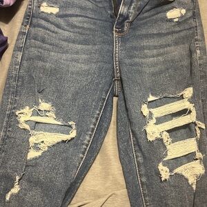 Distressed Blue Denim Jeans